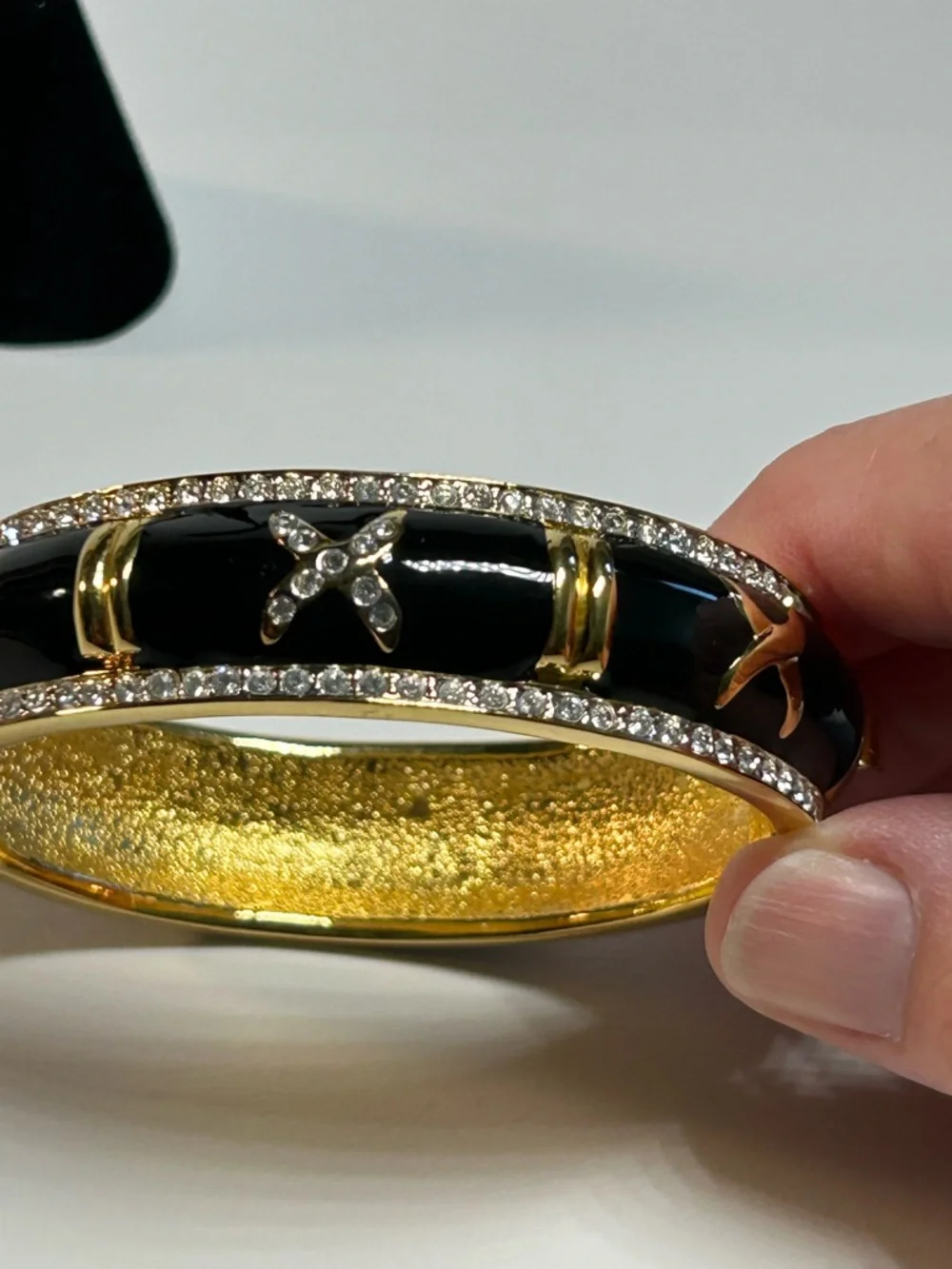 Gold-Tone Black Enamel X Accent Bangle Bracelet